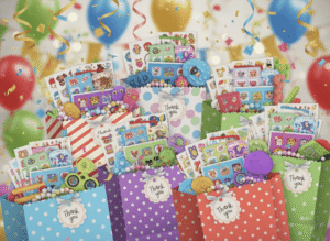 multiple assembled goodie bags placed atop a festive party backdrop